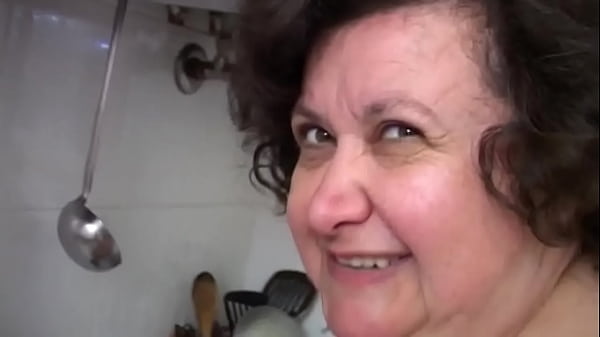 Image Chubby old lady masturbates with broomstick