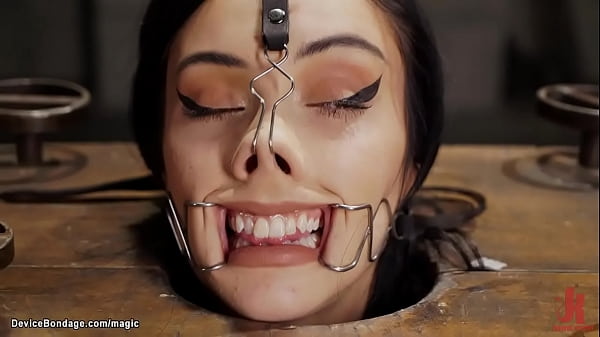 Image Slim bound brunette fucked with dildo