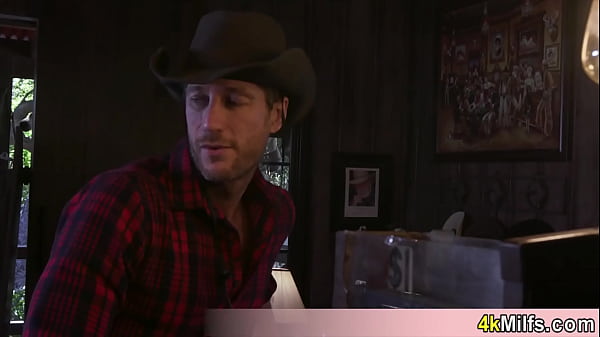 Image Busty blonde cowgirl Christie Stevens gets fucked doggystyle in the pub by a horny cowboy