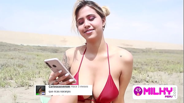 Image Huge tits on the beach, she is horny and wants my cock.