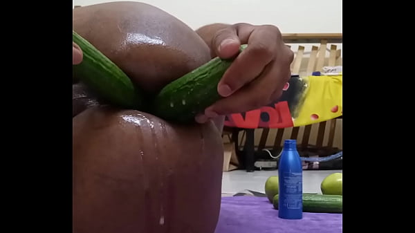 Image Oiled double anal dildo