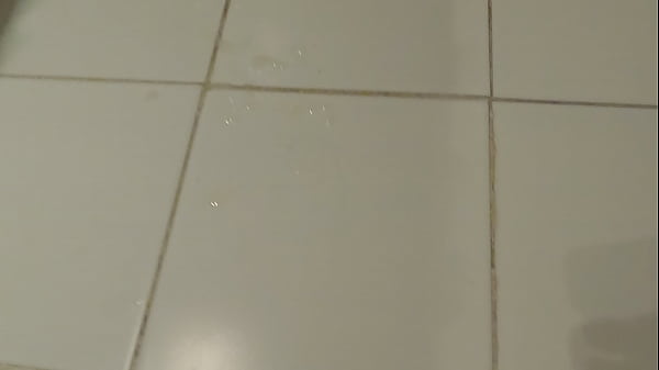 Image Big belly guy in spandex shirt jerking off infront of mirror cumming on the floor