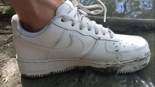 Image Jon Arteen plays in the mud with his new sneakers Nike Air Force One AF1 sockless. Boy foot fetish gay porn video