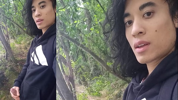 Image Adidas boy Jon Arteen takes selfies, jerks his cock, precum flows from his juicy glans, the horny cutie squirts cum while moaning like a gay twink outside in the rain and the birds singing by the water