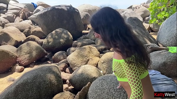Image Real Couple having passionate sex on the beach by the ocean