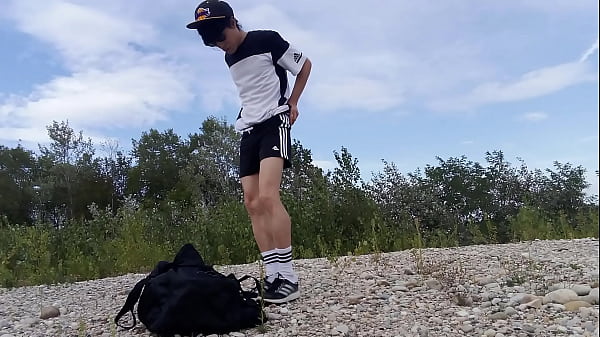 Image Cute twink Jon Arteen wears black Adidas outfit, shows his underwear, walks freeballing, jerking off throught his short shorts, cumming outdoor