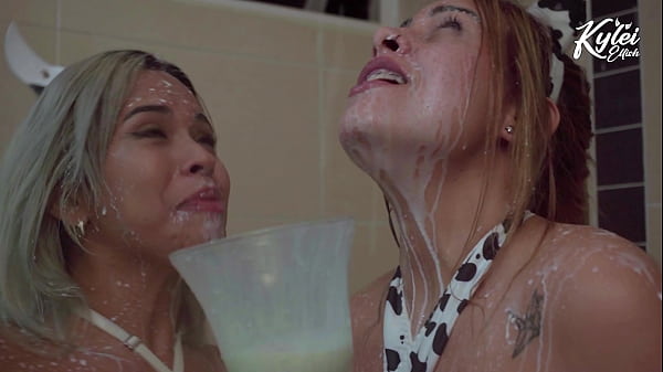 Image Beautiful porn superstars Kylie Ellish and Ann Rides drink a shower of cum and take a bath with it.