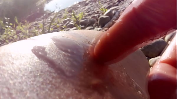 Image Jon Arteen wanks outdoor on a pebbles beach, the sexy twink wearing short shorts cums on his thigh, and cumplay