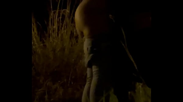 Image Blowjob and mutual masturbation in the field with people watching.