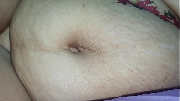 Image Belly and breasts on the bed 2