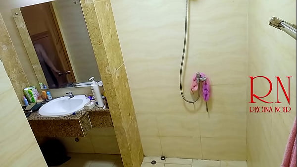 Image Shower. Voyeur camera. Nude Regina Noir in the shower washes and rubs with oil. 1