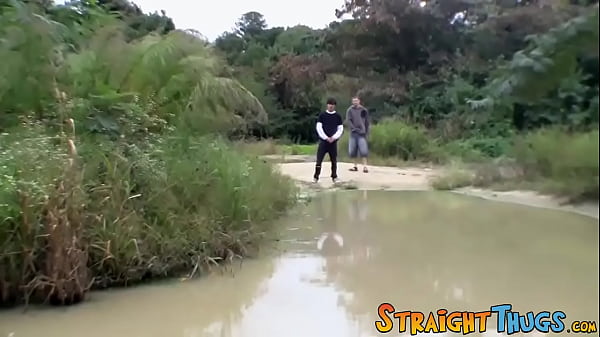 Image Two straight guys are wanking outdoors and competing for cum