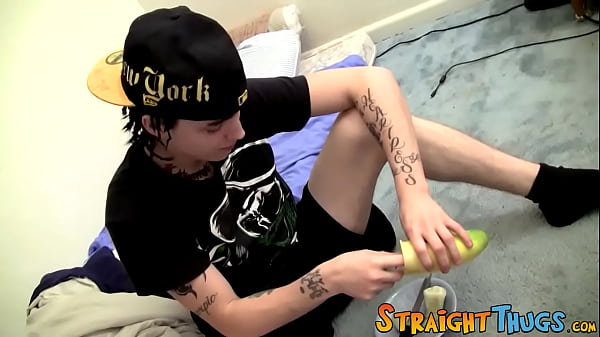 Image Young thug tugging his cock with cucumber help
