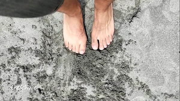 Image playing with my feet on the beach