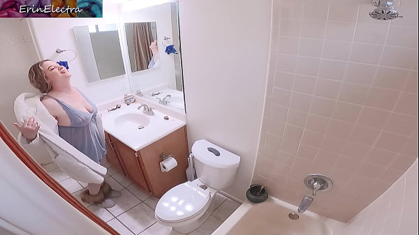 Image Masturbating stepmom in the bathroom invites stepson in for sex