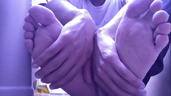 Image RELAXING MY GRAY SOCKS AND MY SWEATY SIZE 10 FEET