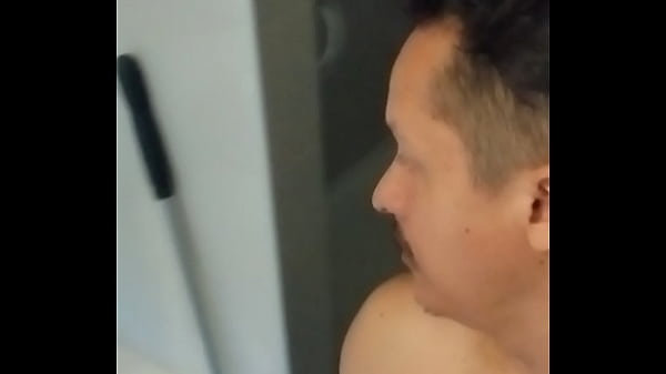 Image Male posing in bathrom with soap