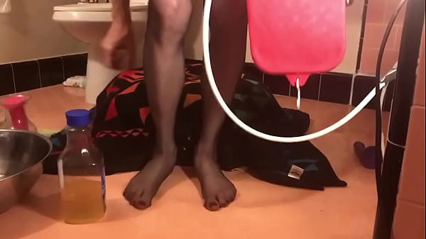 Image Enemas of cold urine and deep anal dildos