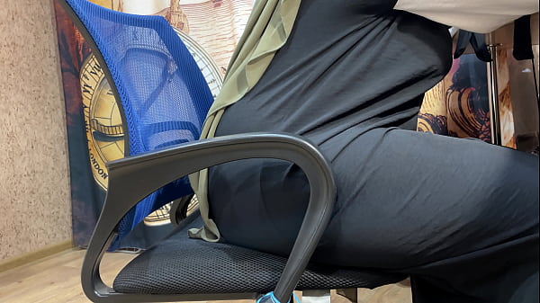 Image Arab woman in hijab masturbates through her panties while working