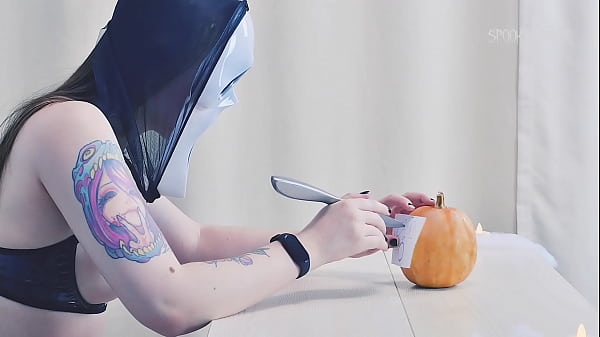 Image Trick or treat? Erotic pumpkin carving with a sexy Ghostface