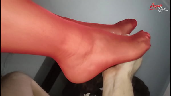 Image MILF in handcuffs and red stockings gets cum on the soles