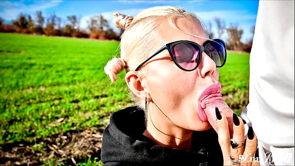Image Adorable cutie sucks my dick in the middle of a field and gets cum in her mouth