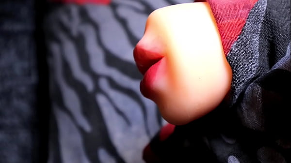 Image The best blowjob in the world close up, the wet mouth very tightly sucks my red slippery head deep into the mouth