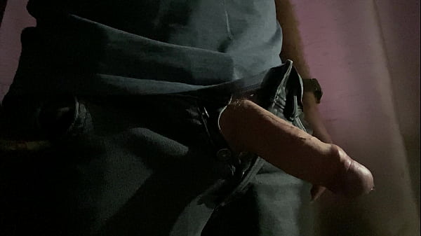 Image Mr Big Dick UK playing with his hard cock as it hangs out of his black jeans