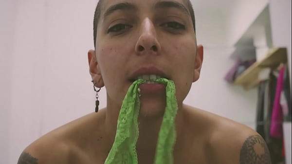 Image Short tattooed girl with green hair does a hot striptease!