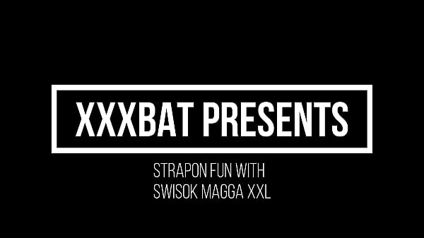 Image XXXBat Mistress using a big strapon on his slave. SWISOK Magga XXL