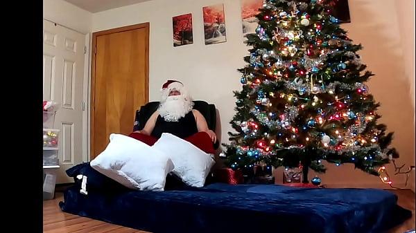 Image Lexie Bell blows Santa