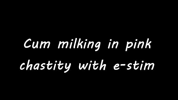 Image Cum milking in pink chastity with e-stim