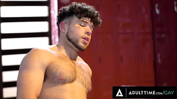Image HETEROFLEXIBLE - Muscle Jock Gets Assfucked By His Teammate In The Locker Room After A Football Game