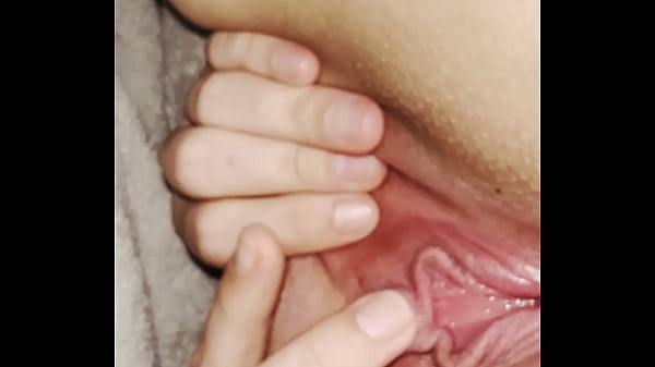 Image Stretching my fat pussy wide open under the covers to get the right position on my clit to help me bust my nutttttt. Feels so fucking good..