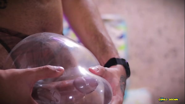 Image Looner Condom Popping Camilo Brown Popping Inflated Condoms With His Big Uncut Cock And Licks His Own Cum From The Condom