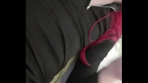 Image Redheaded trans in tight black dress lifts skirt to show red underwear and big anal plug inside ass fingering and big girldick
