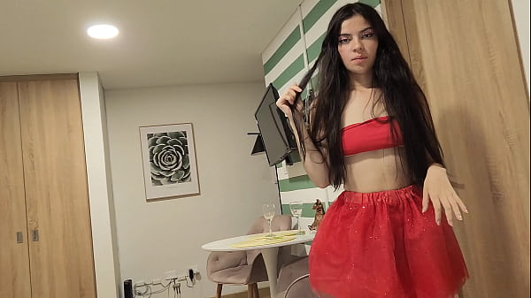 Image Beautiful woman in a red skirt and without underwear, wants to be fucked as a Christmas gift