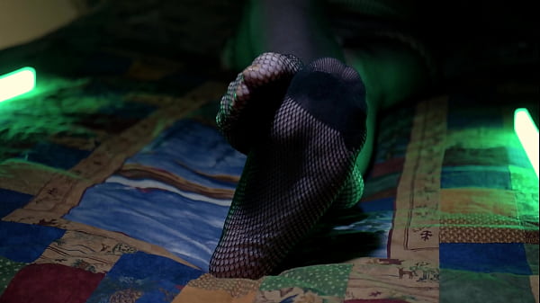 Image Perfect Toes Peeking Through Sexy Fishnets