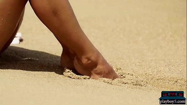 Image Gorgeous MILF Cara Mell from the Ukraine gets naked on a beach somewhere