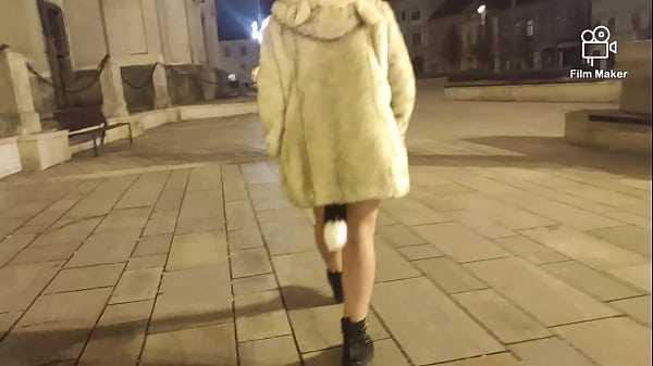 Image Ariela Rider walking with anal plug in sreet