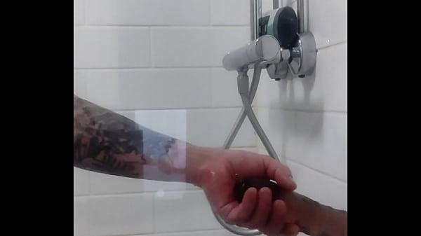 Image T-girl showering with dildo