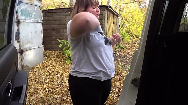 Image Curvy MILF undresses in the car and shows her hairy pussy to the webcam. Amateur fetish in a public place.