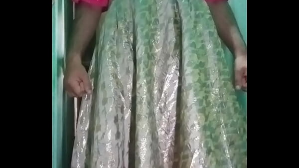 Image Indian Gay Crossdresser Gaurisissy in Pink lehanga pressing his Boobs and fingering in his ass
