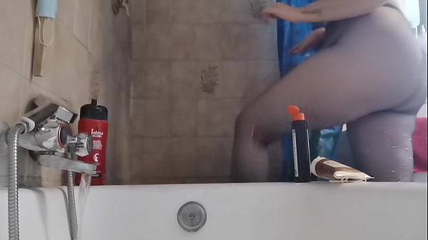 Image Italian stepmom wets her pantyhose in the shower to turn you on