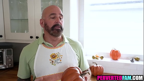 Image Stepdaughter distracted stepdad from preparing thanksgiving dinner