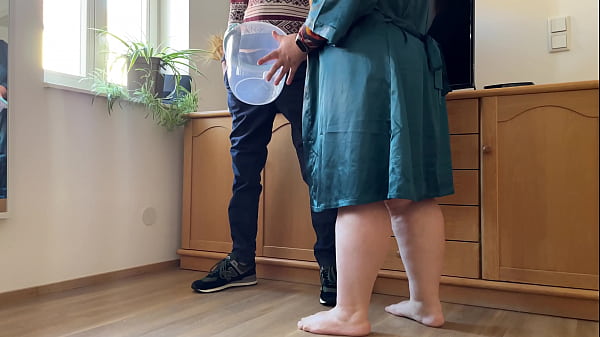 Image Dear Stepmother-in-law takes off her panties and pees with her legs wide open in a bucket next to her son-in-law