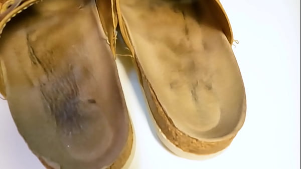 Image Fucking and cumming into old leather slippers