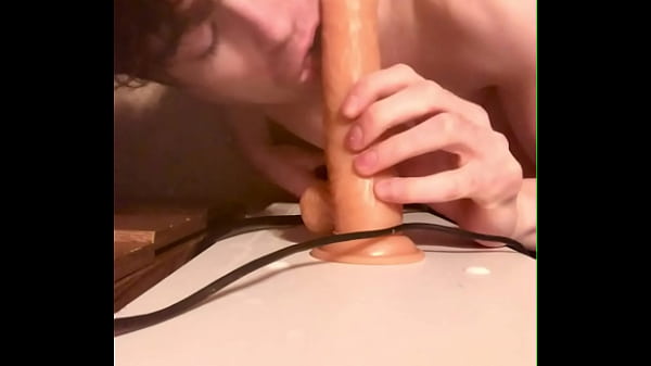 Image Cock-loving twink Niko Springs devours giant dildo
