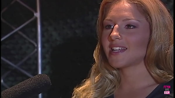 Image A fuckable blonde radio host uses stockings and a leather costume to seduce her husband