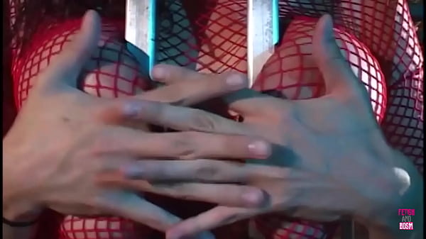 Image A brunette in a cage deepthroats and sucks a cock in order to be free